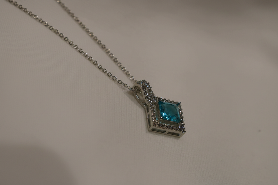 Square Silver Plated Pendant inside Blue Stone including Chain